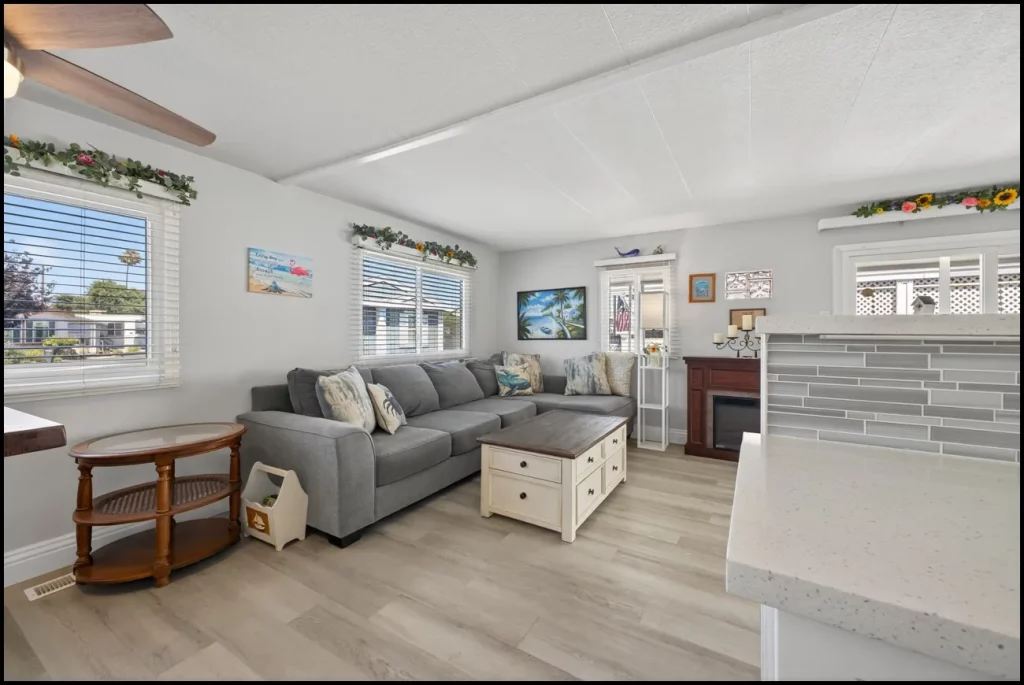 a living room with a couch and a fireplace