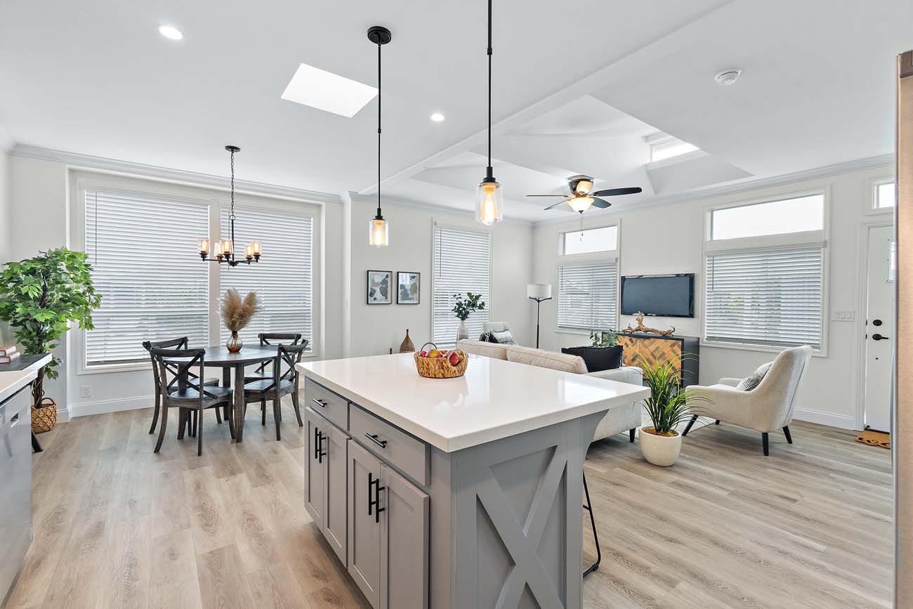 Beach Boulevard kitchen island overlooking the dining and living areas